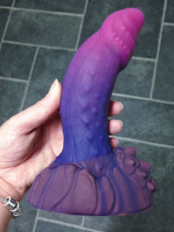 A dragon dildo is a large sex toy molded to look like the theoretical phall...